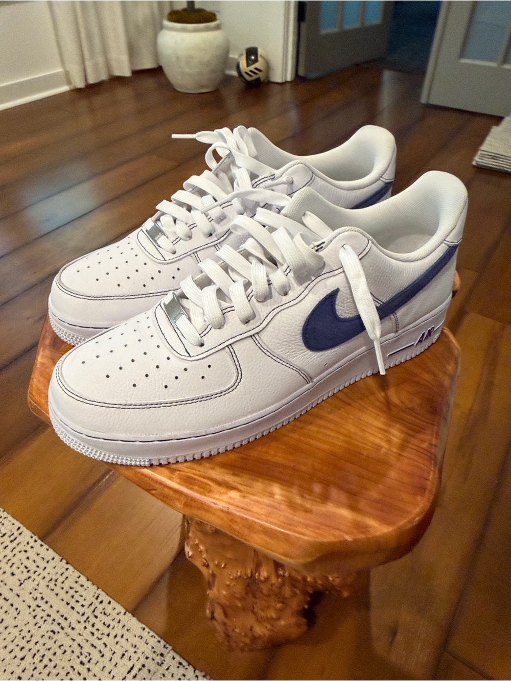 Nike Air Force 1 Men's White Sneakers with Blue Swoosh